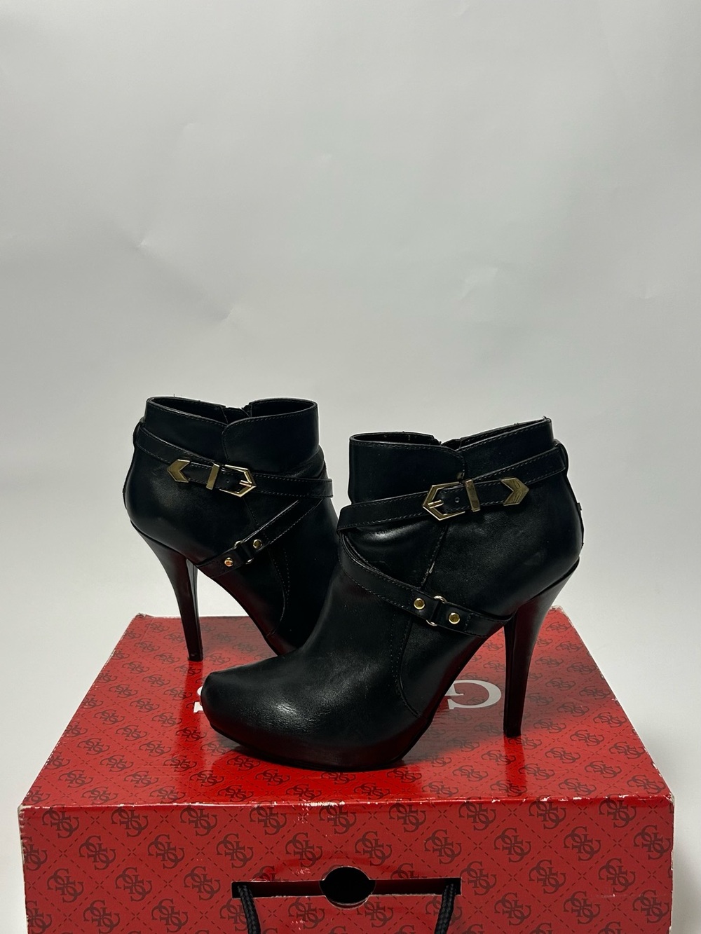 Guess Women's Black Leather Ankle Booties with Gold Buckle Hardware